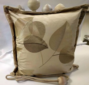 sand embroidered cushion